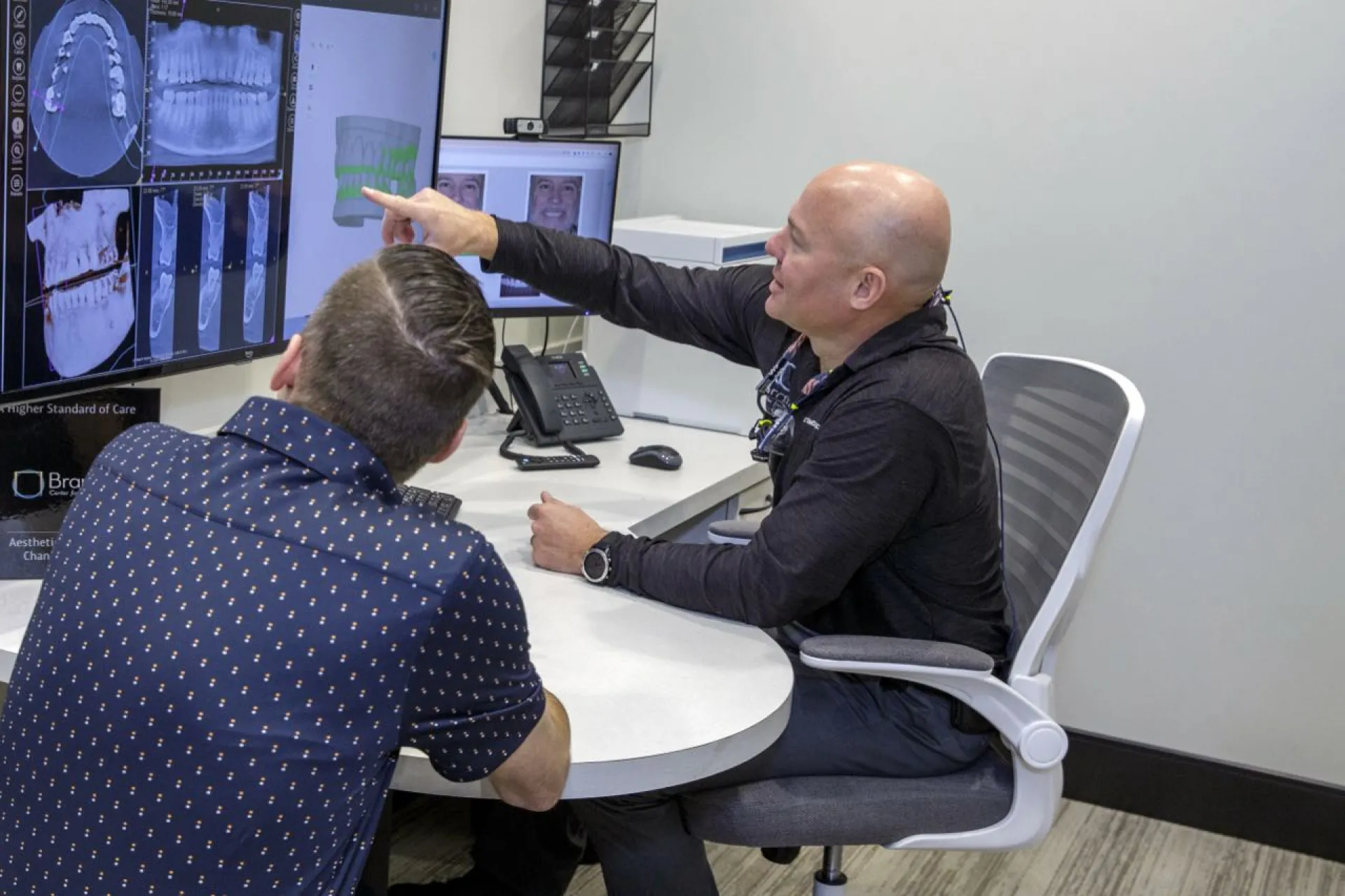 Dr. Dudley explains a procedure to a patient