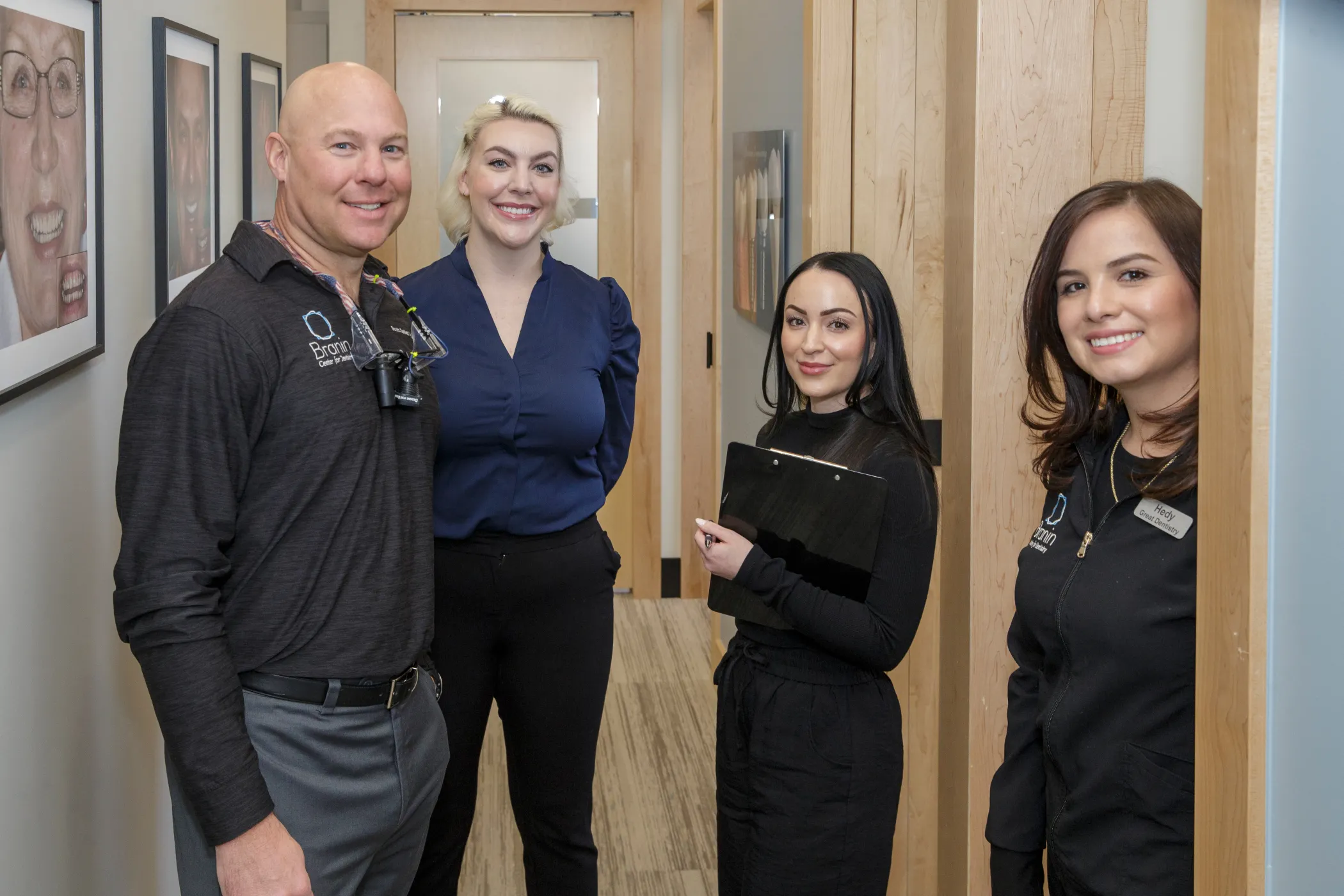 Dr. Dudley, Dr. Sesson and a few other team members of superior smiling.