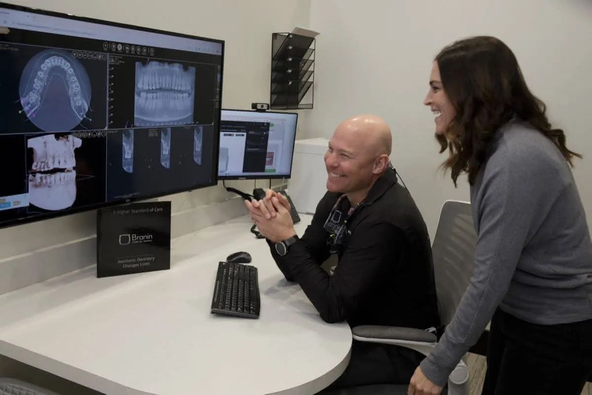 Doctor reviews x-rays with a patient