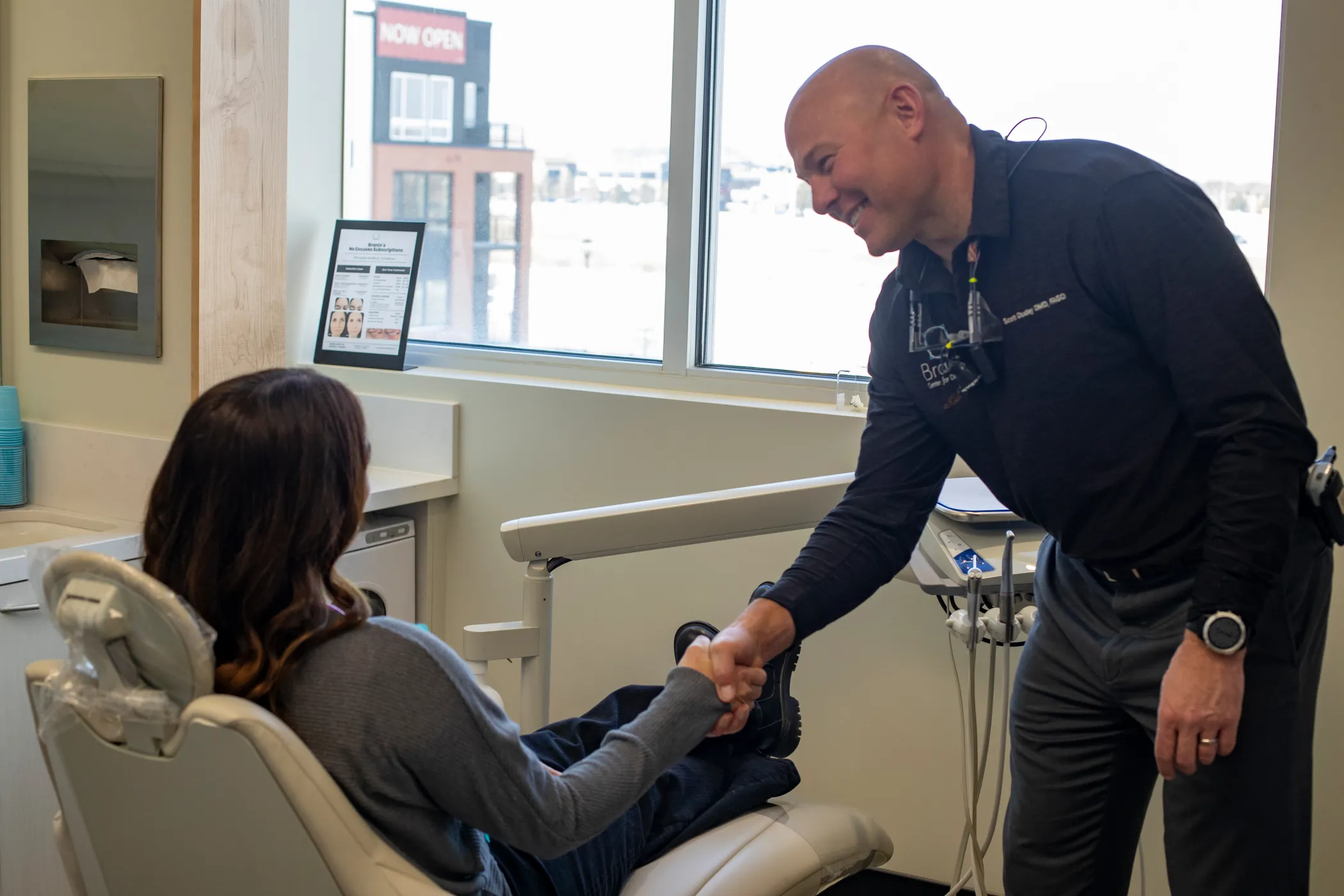 Dr. Dudley with a happy patient.